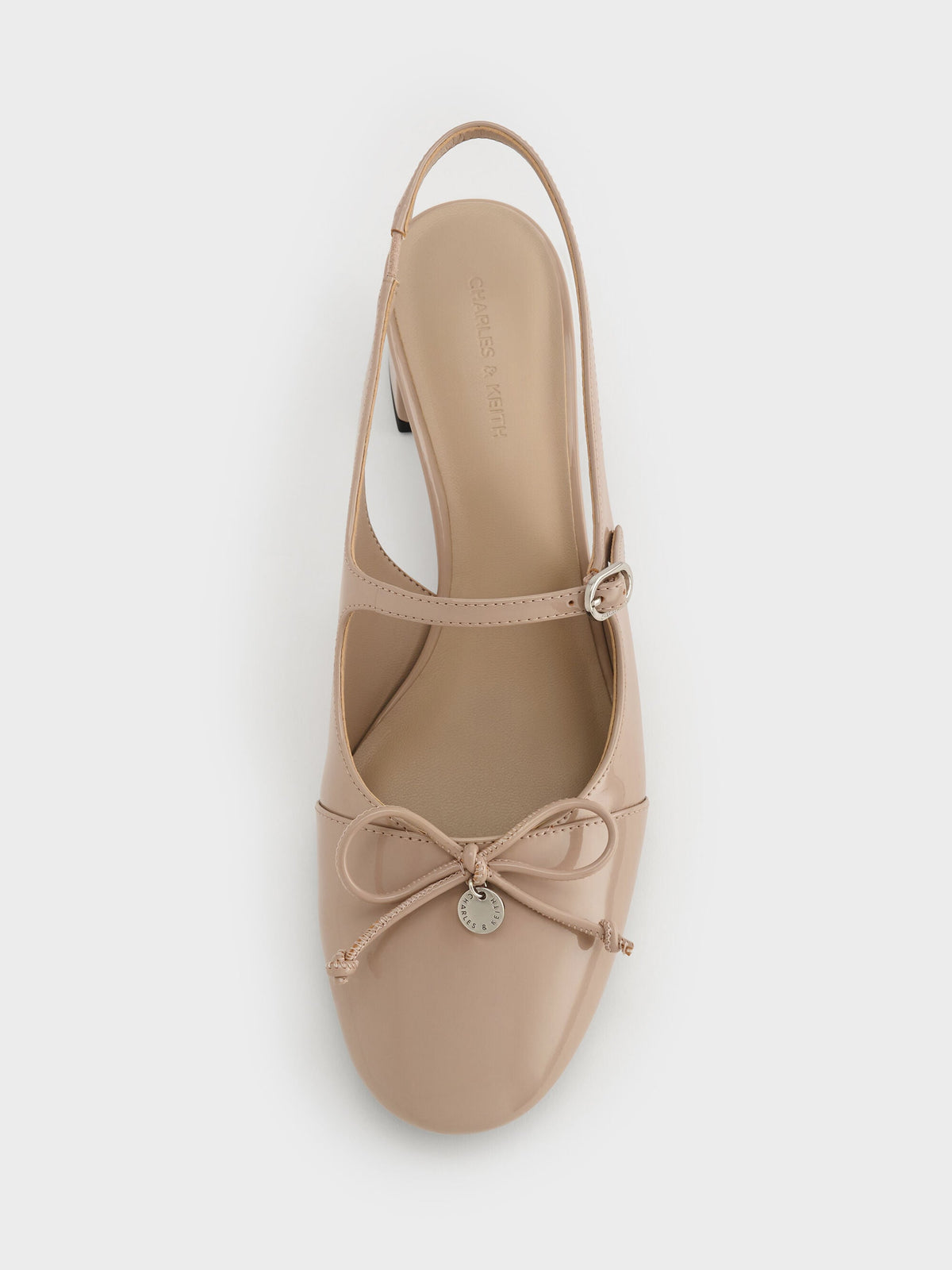 CHARLES & KEITH Discount / Patent Bow Slingback Pumps - Nude