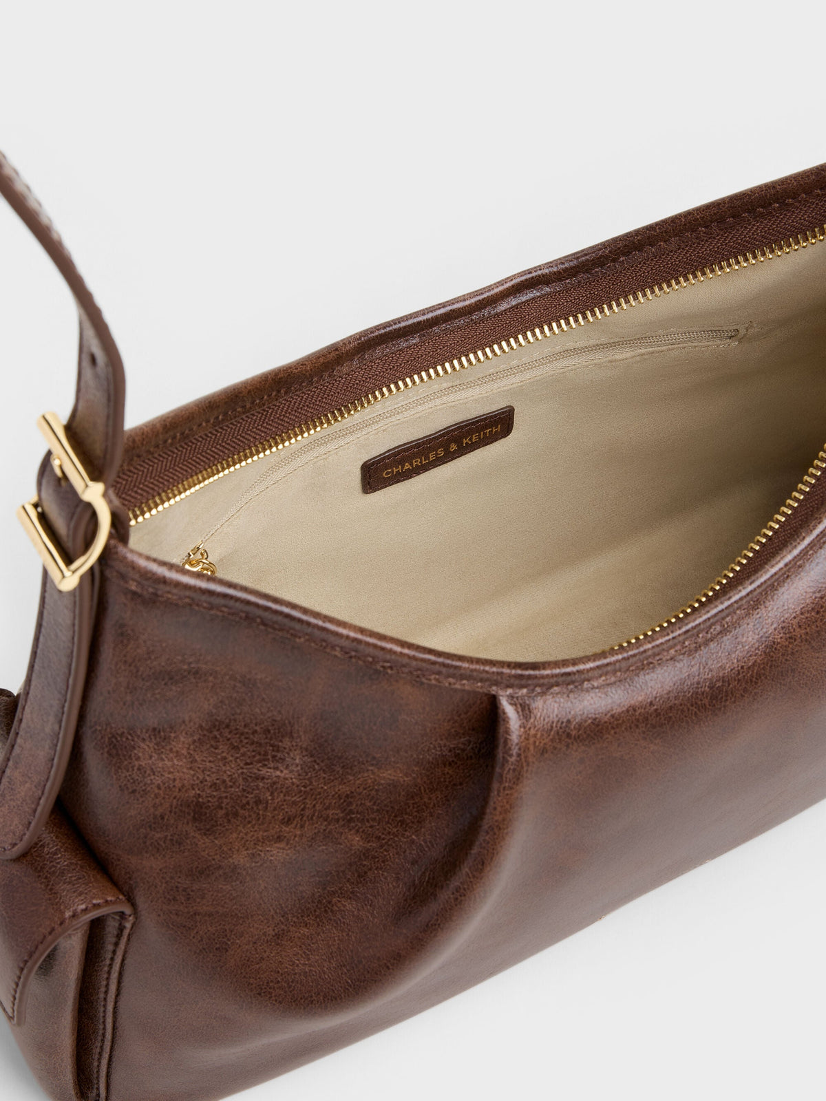 CHARLES & KEITH Premium / Khai Side-Pocket Shoulder Bag - Distressed Coffee