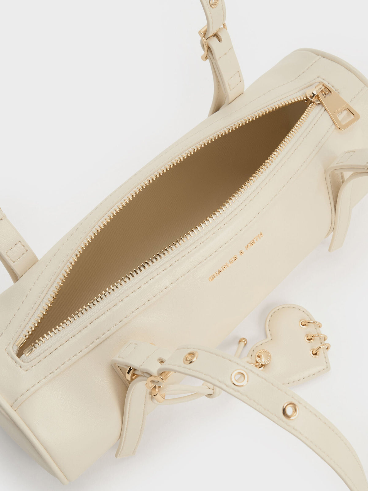 CHARLES & KEITH Customer Favorite / Rey Elongated Shoulder Bag - Cream