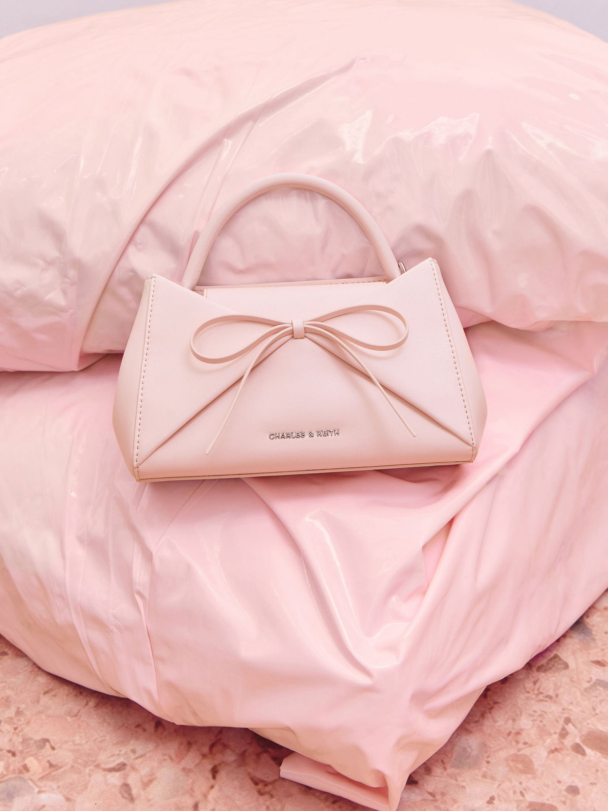 CHARLES & KEITH Signature / Hazel Bow Panelled Top Handle Bag - Soft Pink