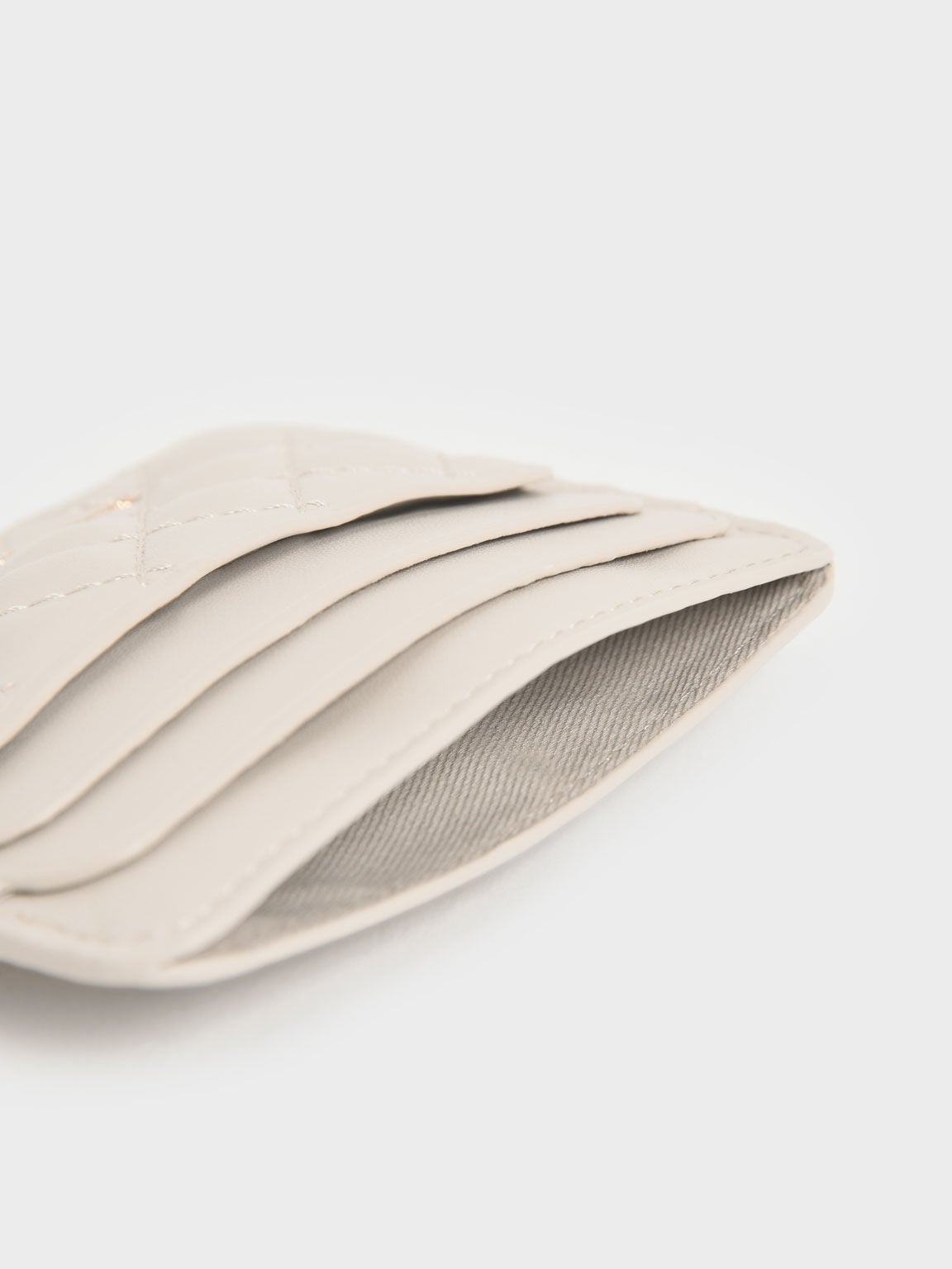 CHARLES & KEITH Top Pick / Cleo Quilted Card Holder - Ivory
