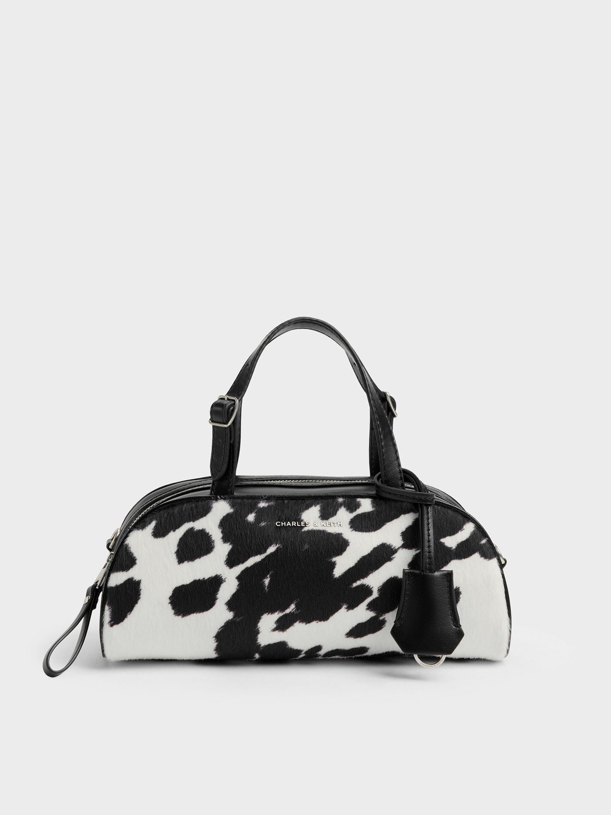 CHARLES & KEITH Value / Vega Furry Cow-Print Elongated Bowling Bag - Multi