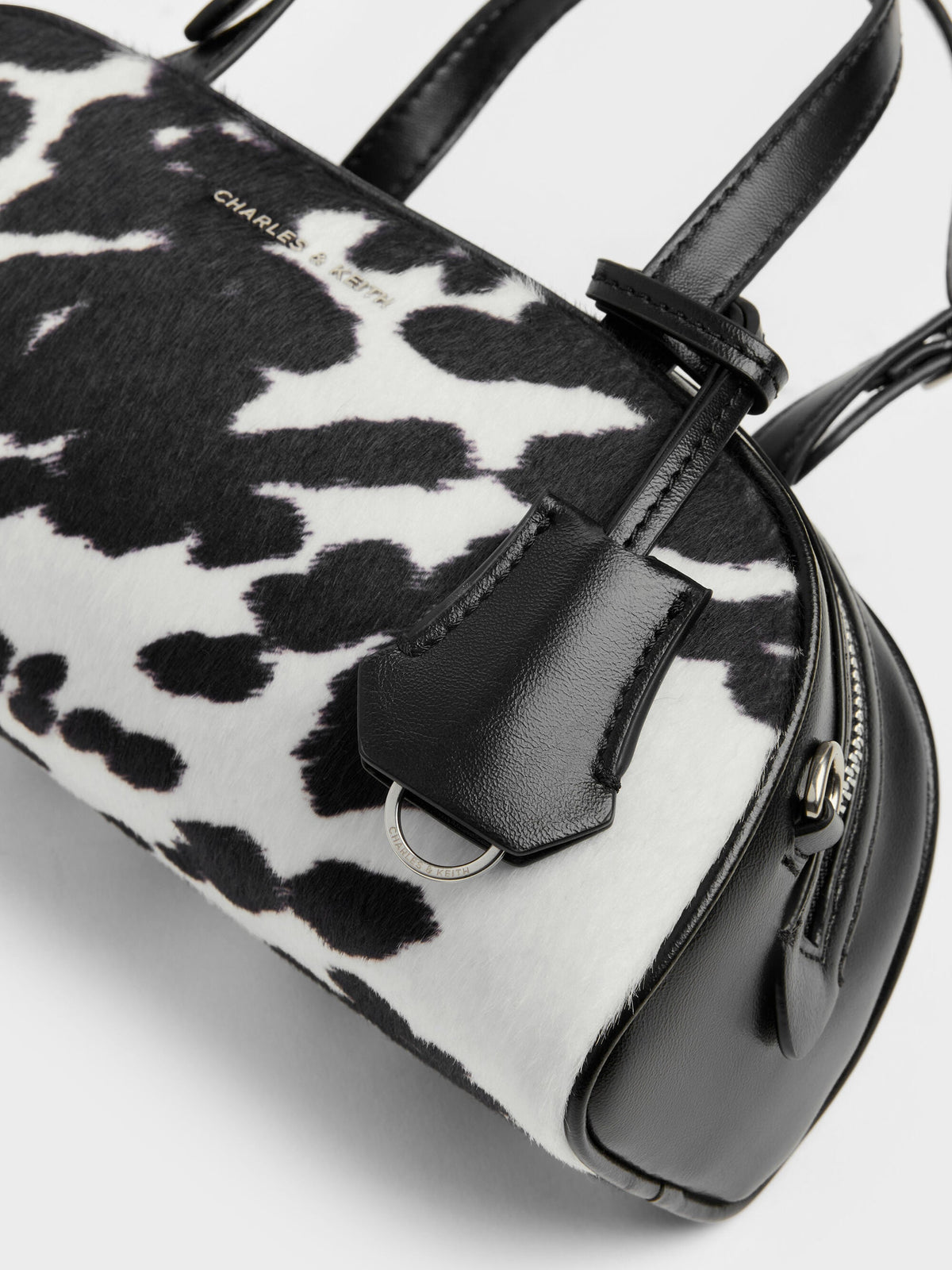 CHARLES & KEITH Value / Vega Furry Cow-Print Elongated Bowling Bag - Multi