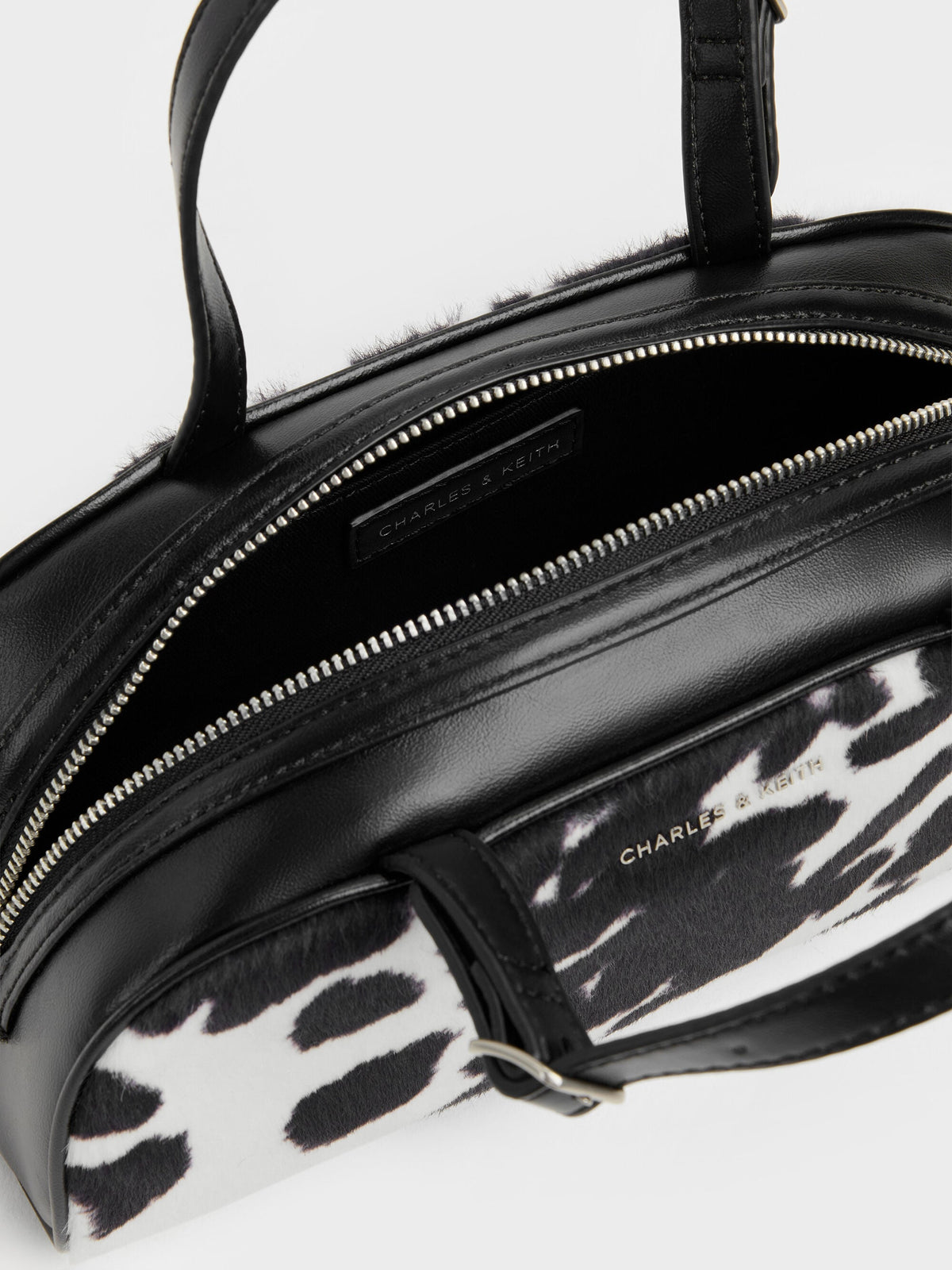 CHARLES & KEITH Value / Vega Furry Cow-Print Elongated Bowling Bag - Multi