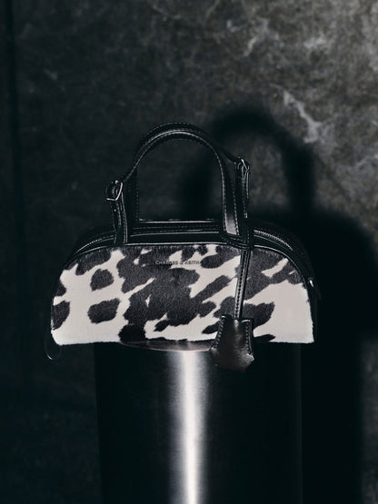 CHARLES & KEITH Value / Vega Furry Cow-Print Elongated Bowling Bag - Multi