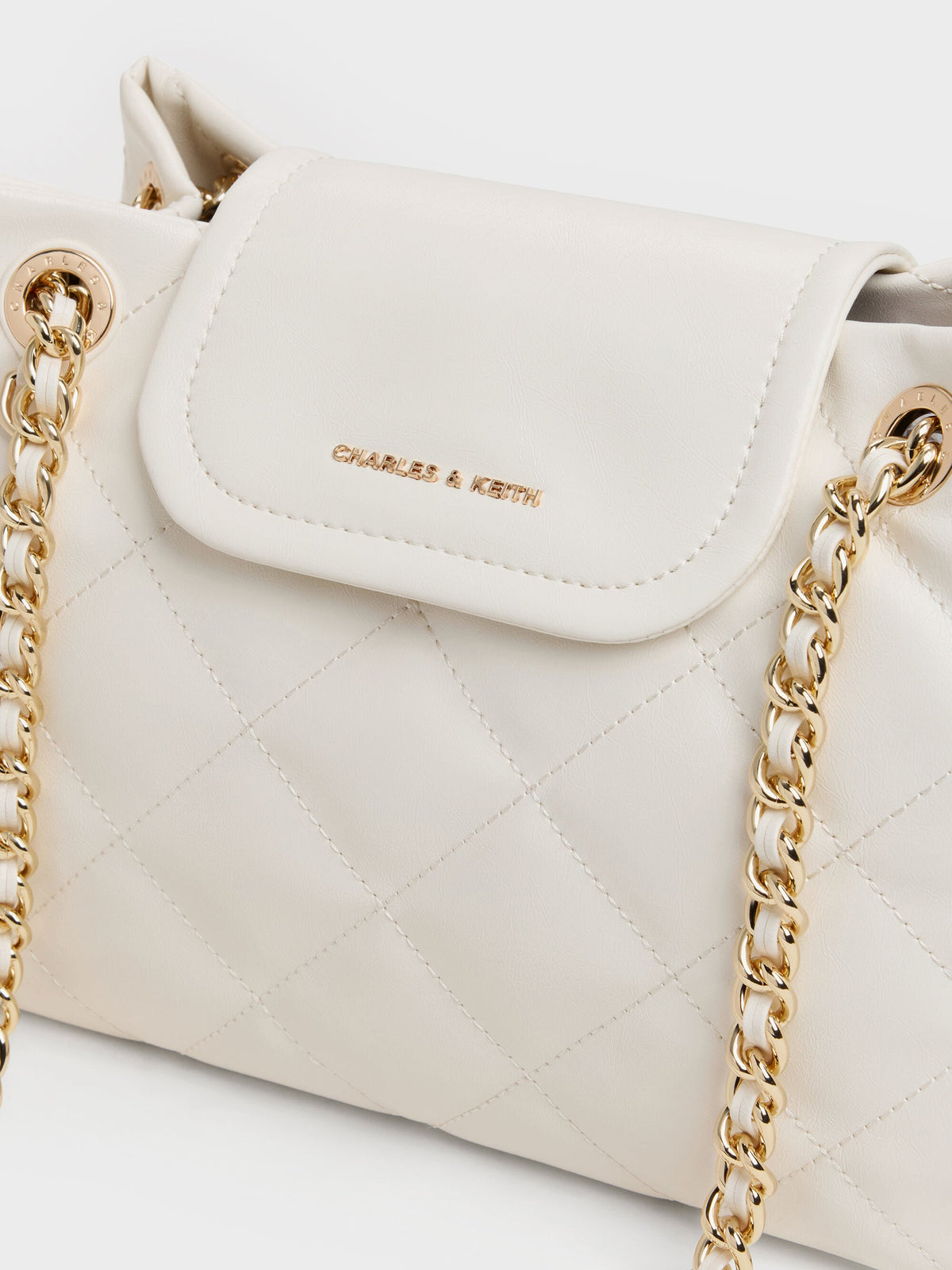 CHARLES & KEITH Trusted / Apfra Quilted Shoulder Bag - Cream