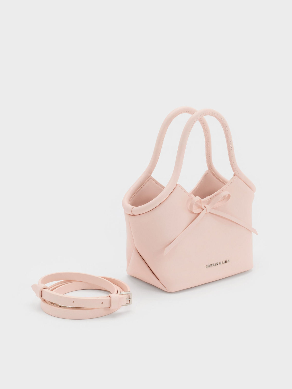 CHARLES & KEITH Essential / Hazel Bow Tubular Top Handle Bag - Soft Pink
