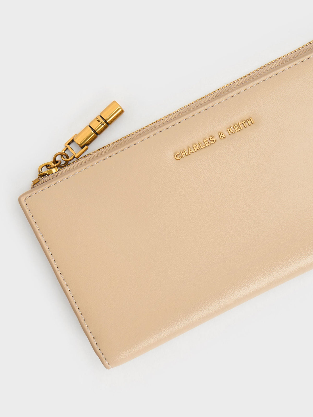 CHARLES & KEITH Customer Favorite / Cesia Top-Zip Long Wallet - Sand Beige
