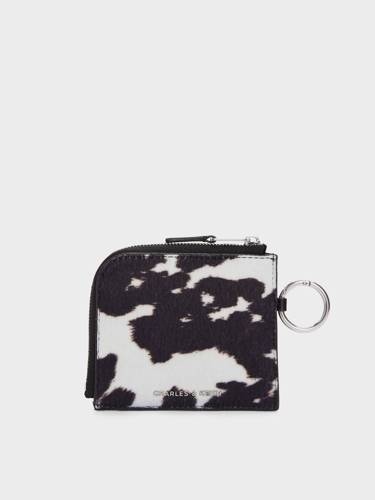 CHARLES & KEITH Signature / Vega Furry Cow-Print Zip-Around Pouch - Multi