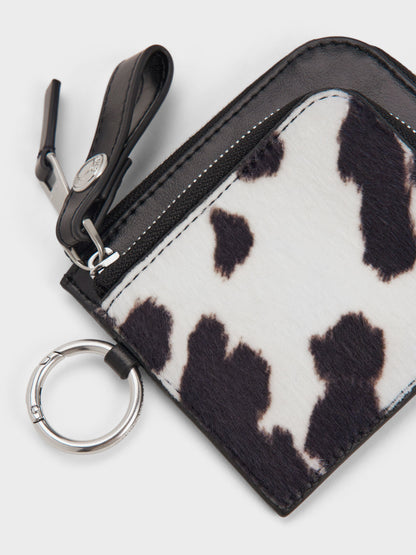 CHARLES & KEITH Signature / Vega Furry Cow-Print Zip-Around Pouch - Multi