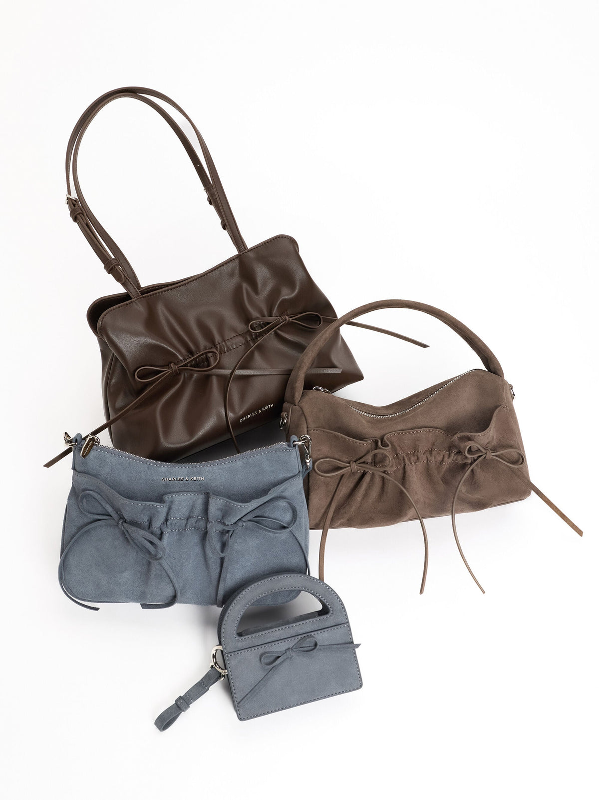 CHARLES & KEITH Essential / Reese Bow Top Handle Wristlet - Smoky Blue