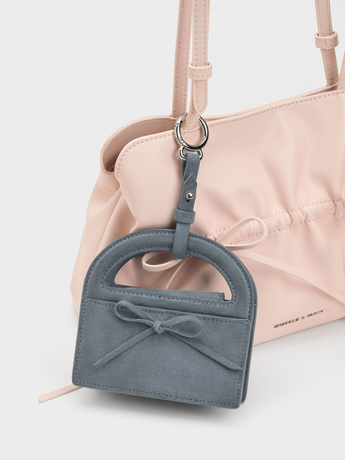 CHARLES & KEITH Essential / Reese Bow Top Handle Wristlet - Smoky Blue