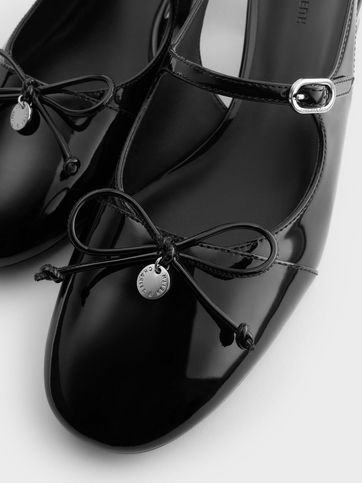 CHARLES & KEITH Smart Buy / Patent Bow Slingback Pumps - Black Patent