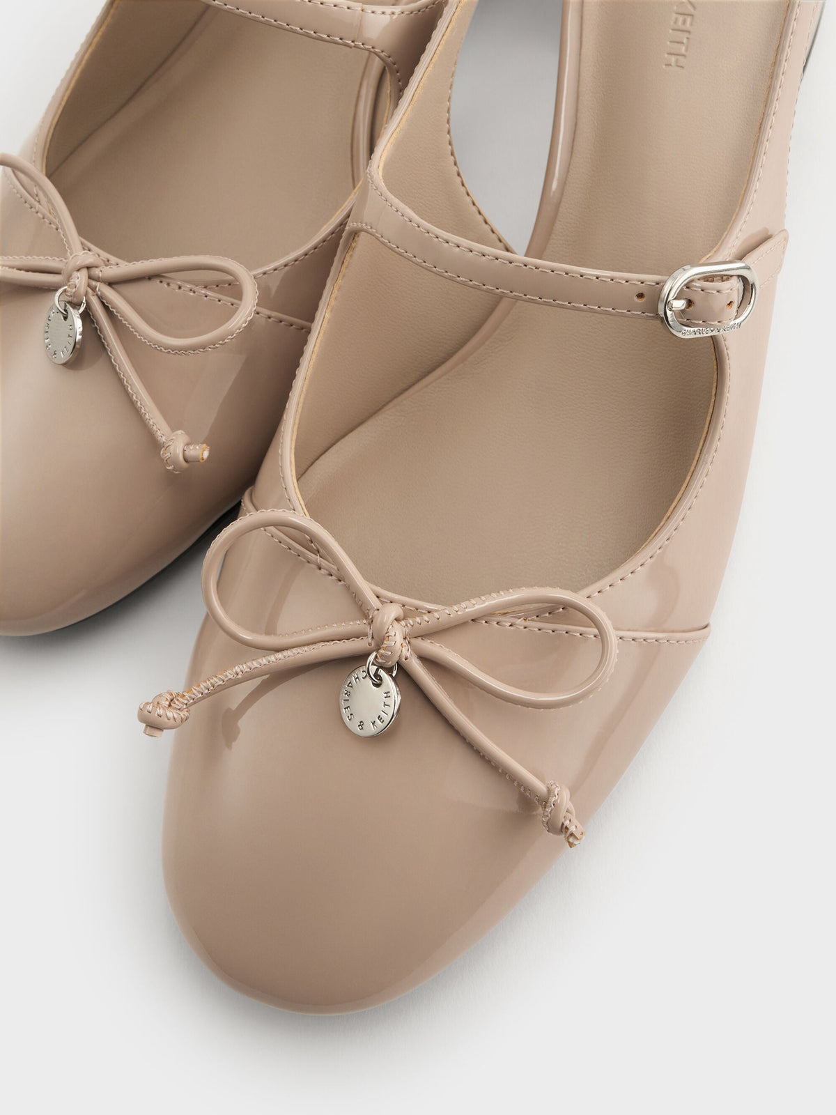 CHARLES & KEITH Discount / Patent Bow Slingback Pumps - Nude