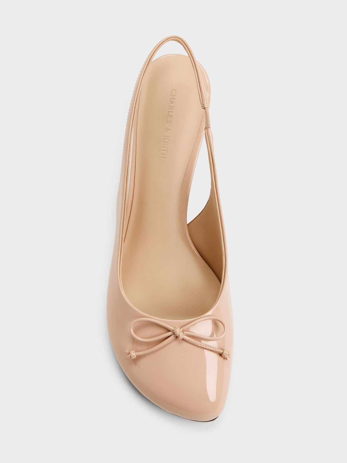 CHARLES & KEITH Everyday / Imani Patent Asymmetric Slingback Pumps - Nude
