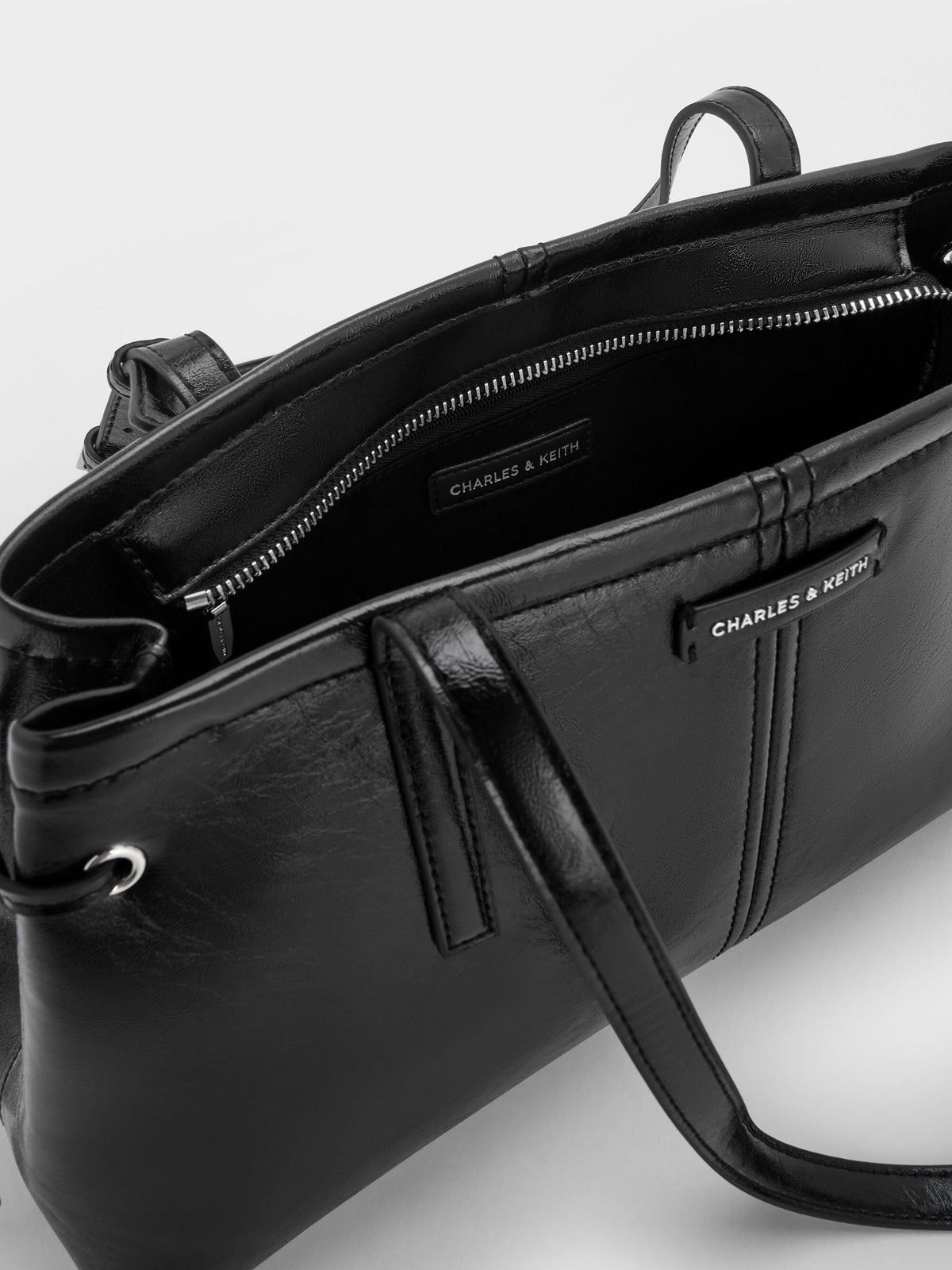 CHARLES & KEITH Deals / Noane Elongated-Handle Shoulder Bag - Noir