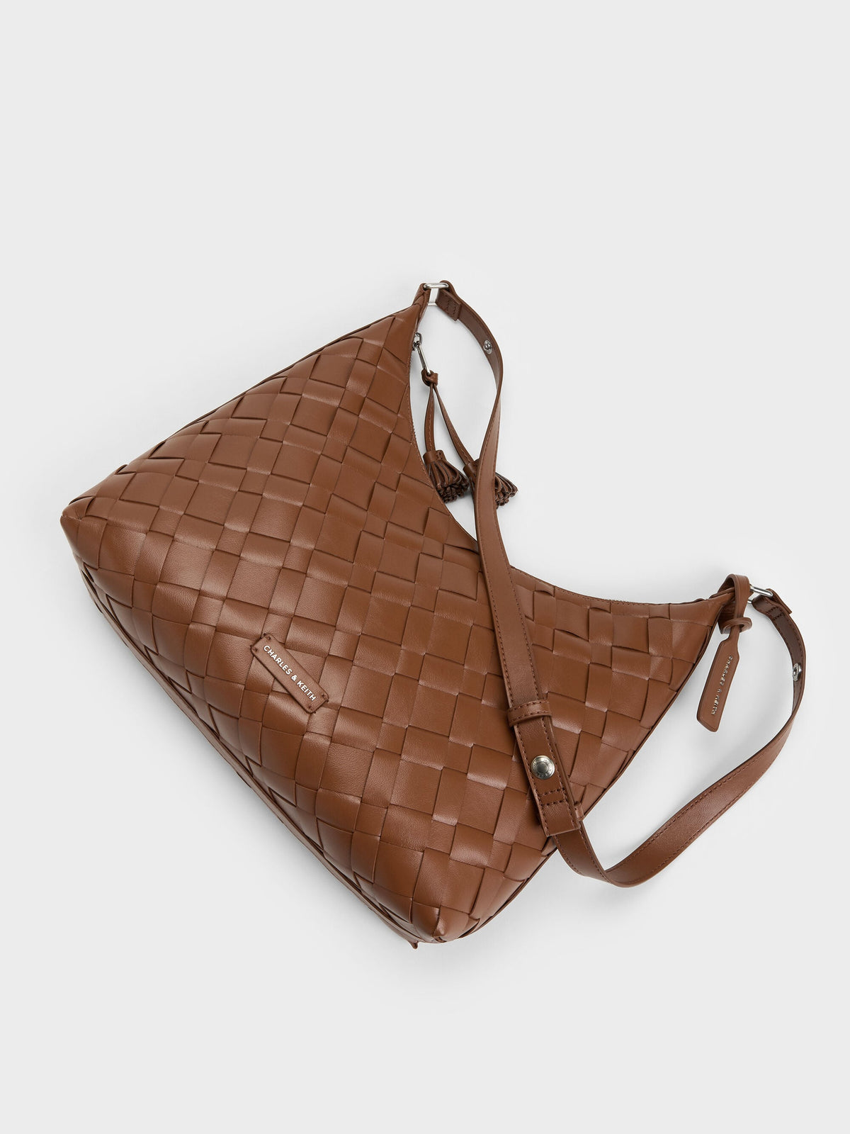 CHARLES & KEITH Deals / Ivette Woven Tassel Hobo Bag - Chocolate