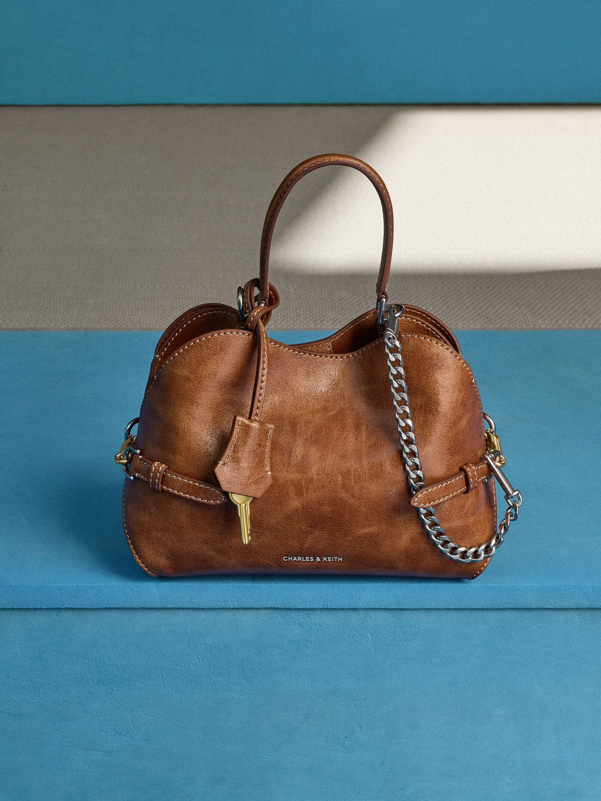 CHARLES & KEITH Discount / Delfina Chain Side-Belt Tote Bag - Distressed Tan