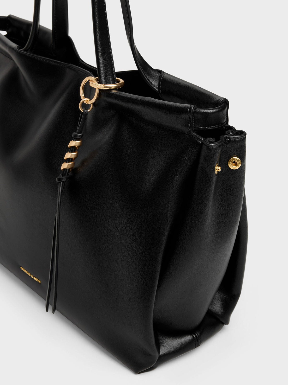CHARLES & KEITH Sale / XL Zephyr Tassel Tote Bag - Black