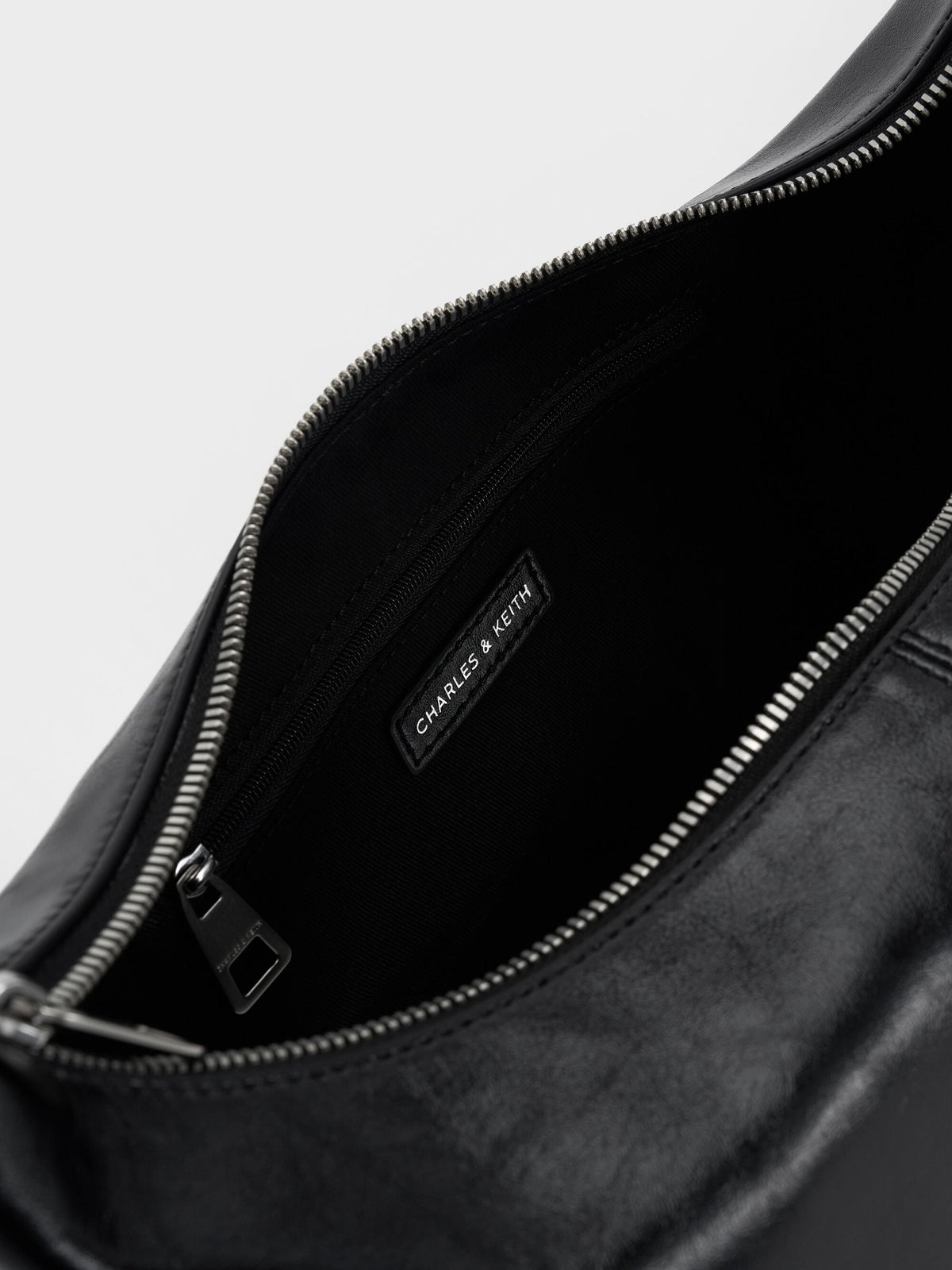 CHARLES & KEITH Best Seller / Bessie Side-Pocket Hobo Bag - Noir