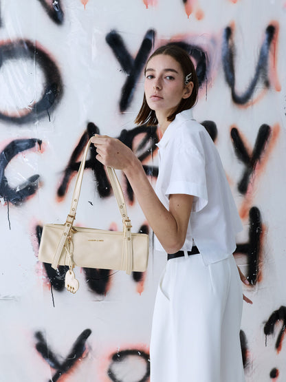 CHARLES & KEITH Customer Favorite / Rey Elongated Shoulder Bag - Cream