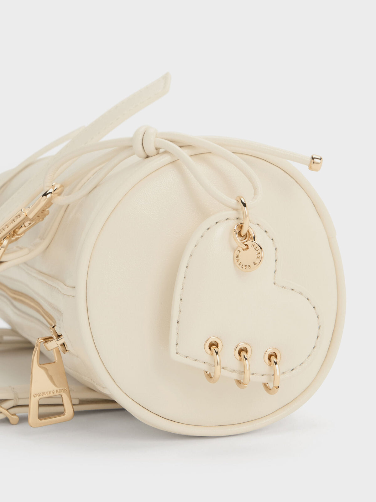 CHARLES & KEITH Customer Favorite / Rey Elongated Shoulder Bag - Cream