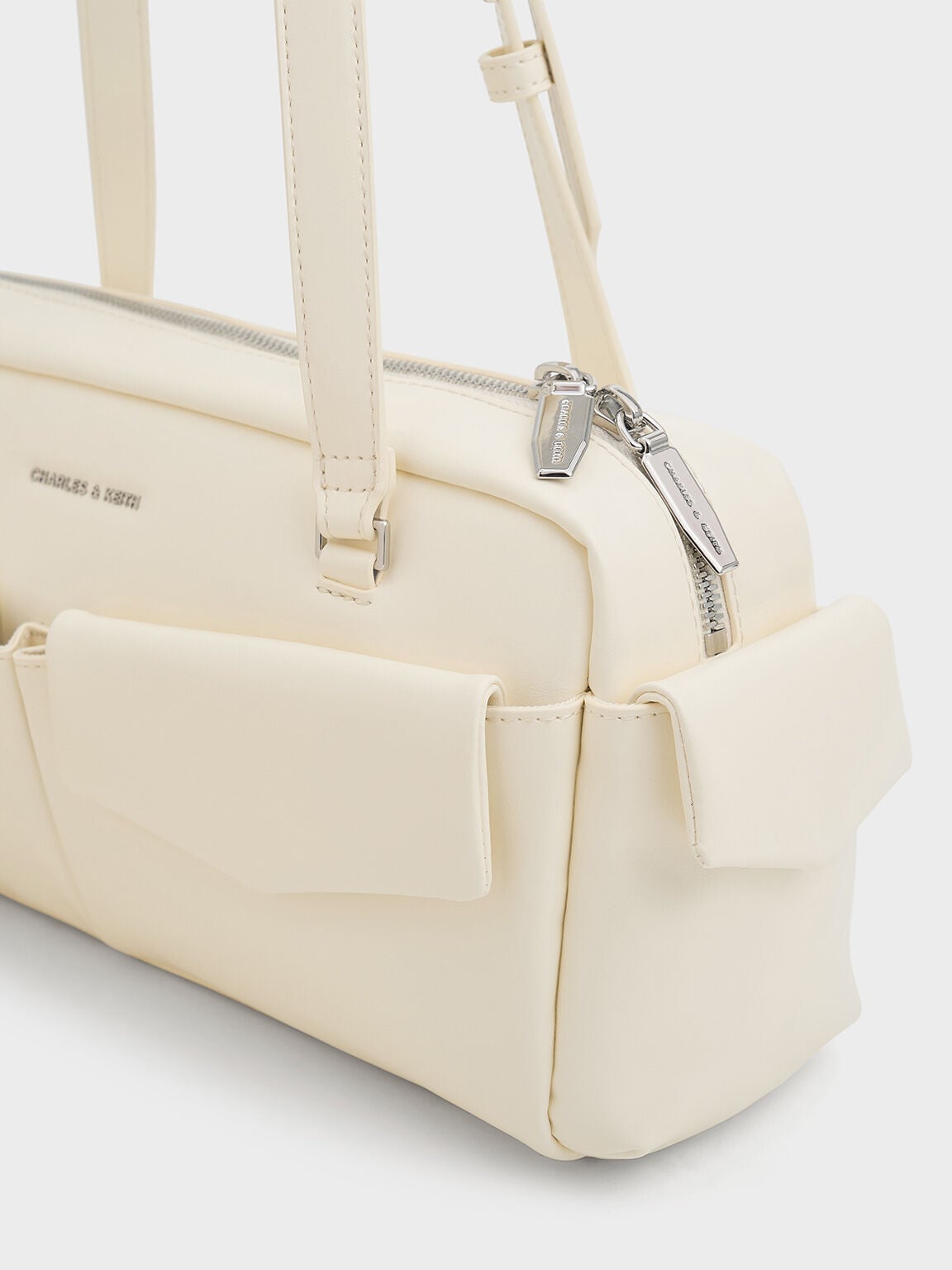 CHARLES & KEITH Customer Favorite / Rachel Multi-Pocket Shoulder Bag - Cream