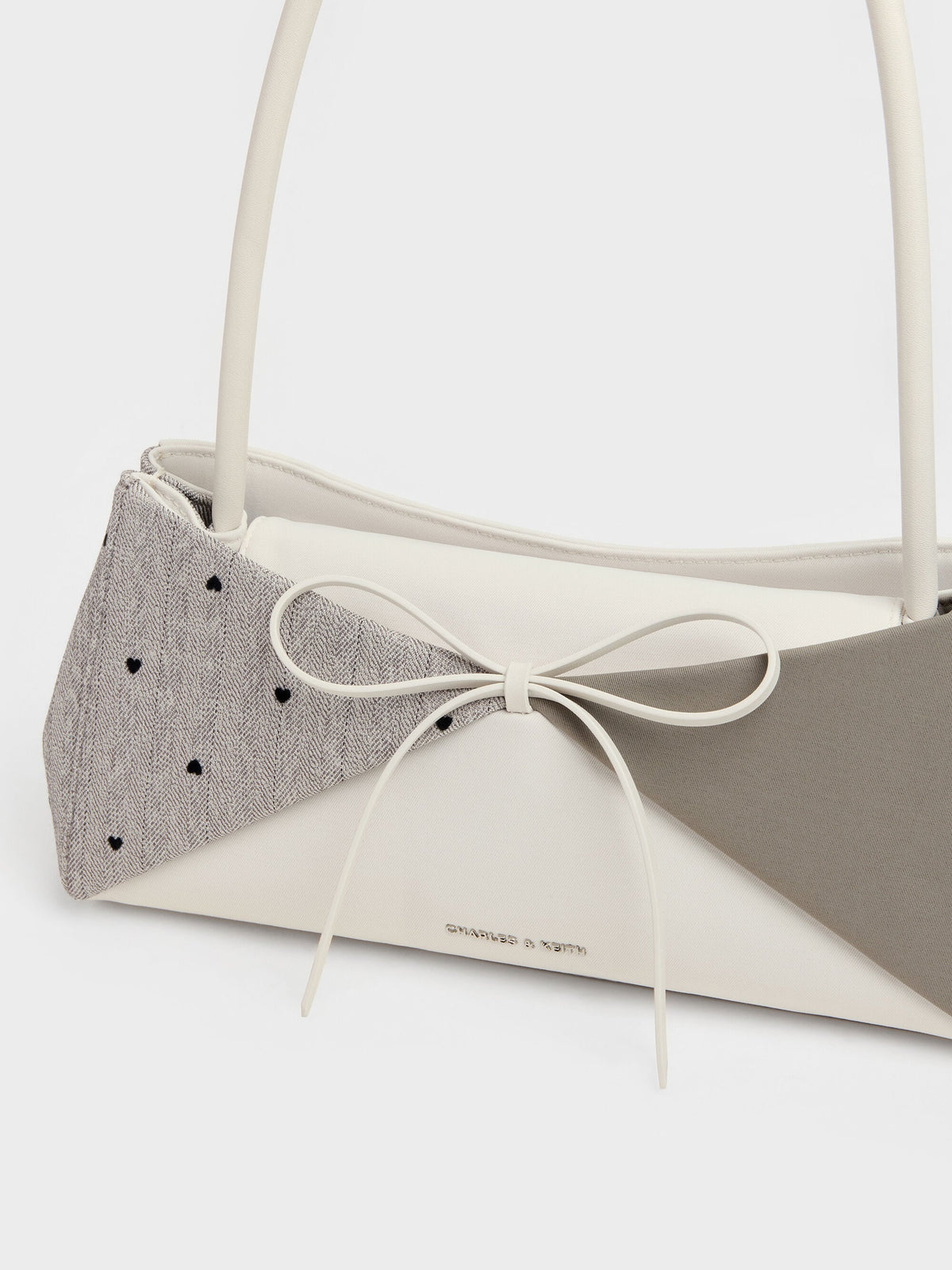 CHARLES & KEITH Top Pick / Hazel Heart-Print Bow Panelled Shoulder Bag - Taupe