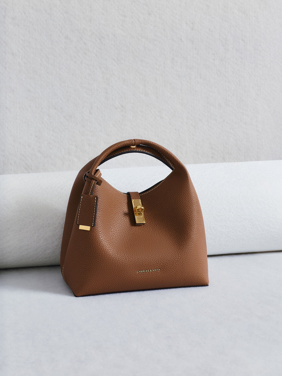 CHARLES & KEITH Essential / Chance Turn-Lock Bucket Bag - Chocolate