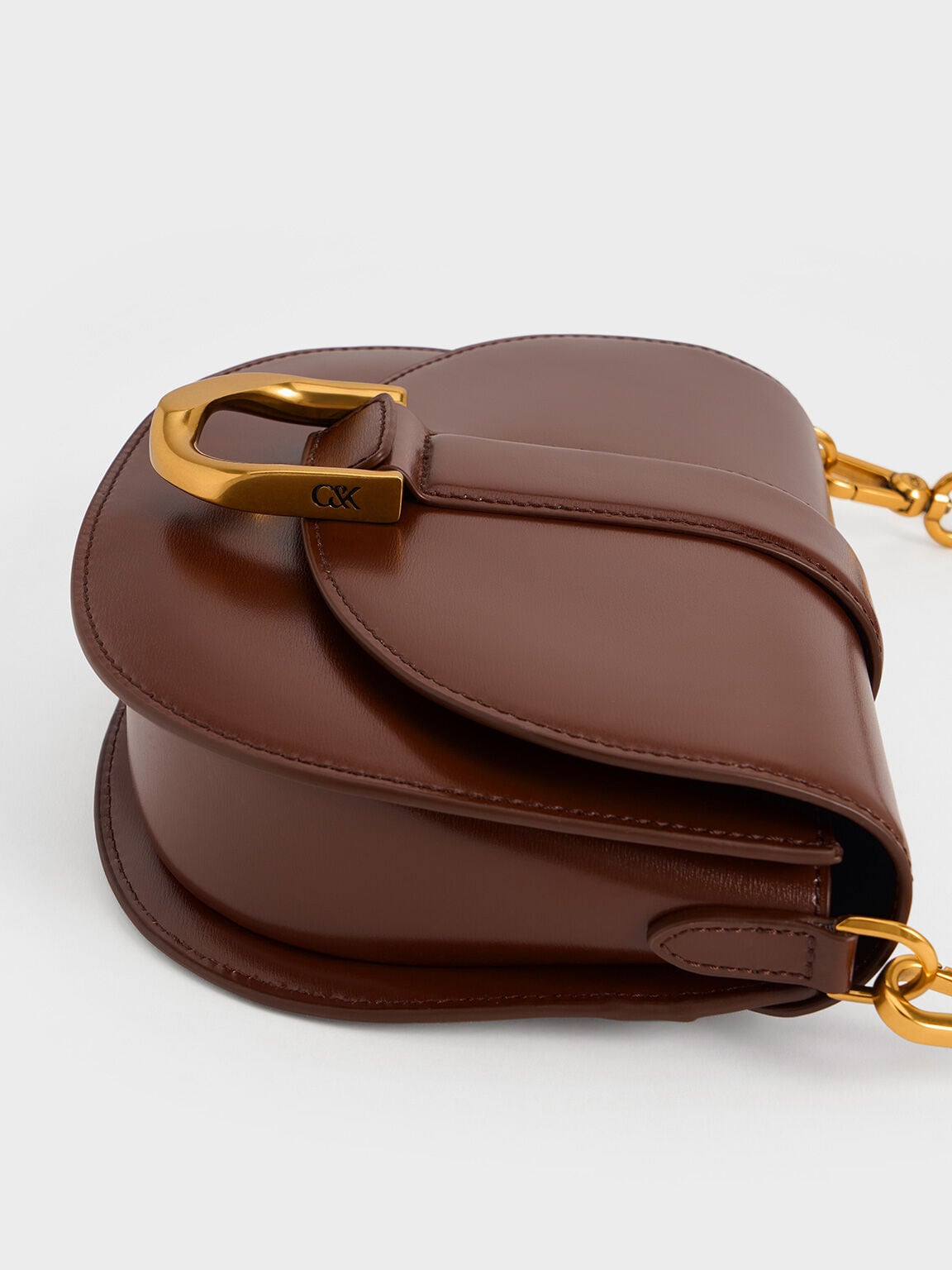 CHARLES & KEITH Hot Sale / Gabine Leather Saddle Bag - Dark Brown