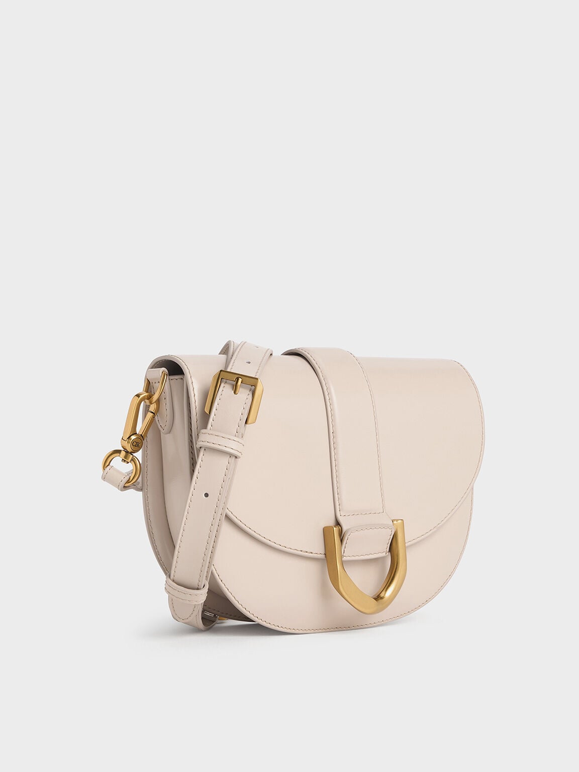 CHARLES & KEITH Deals / Gabine Leather Saddle Bag - Oat