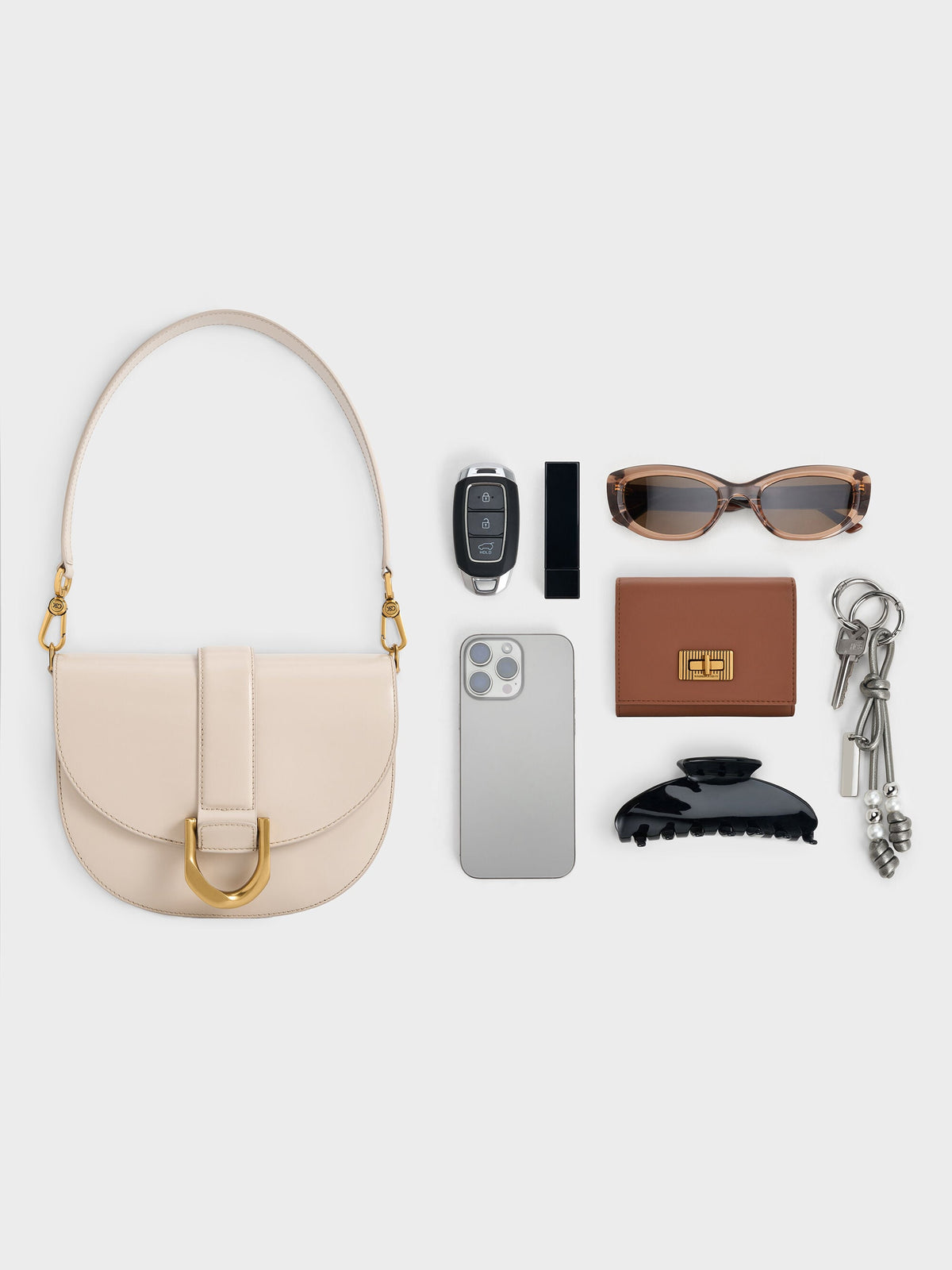 CHARLES & KEITH Deals / Gabine Leather Saddle Bag - Oat