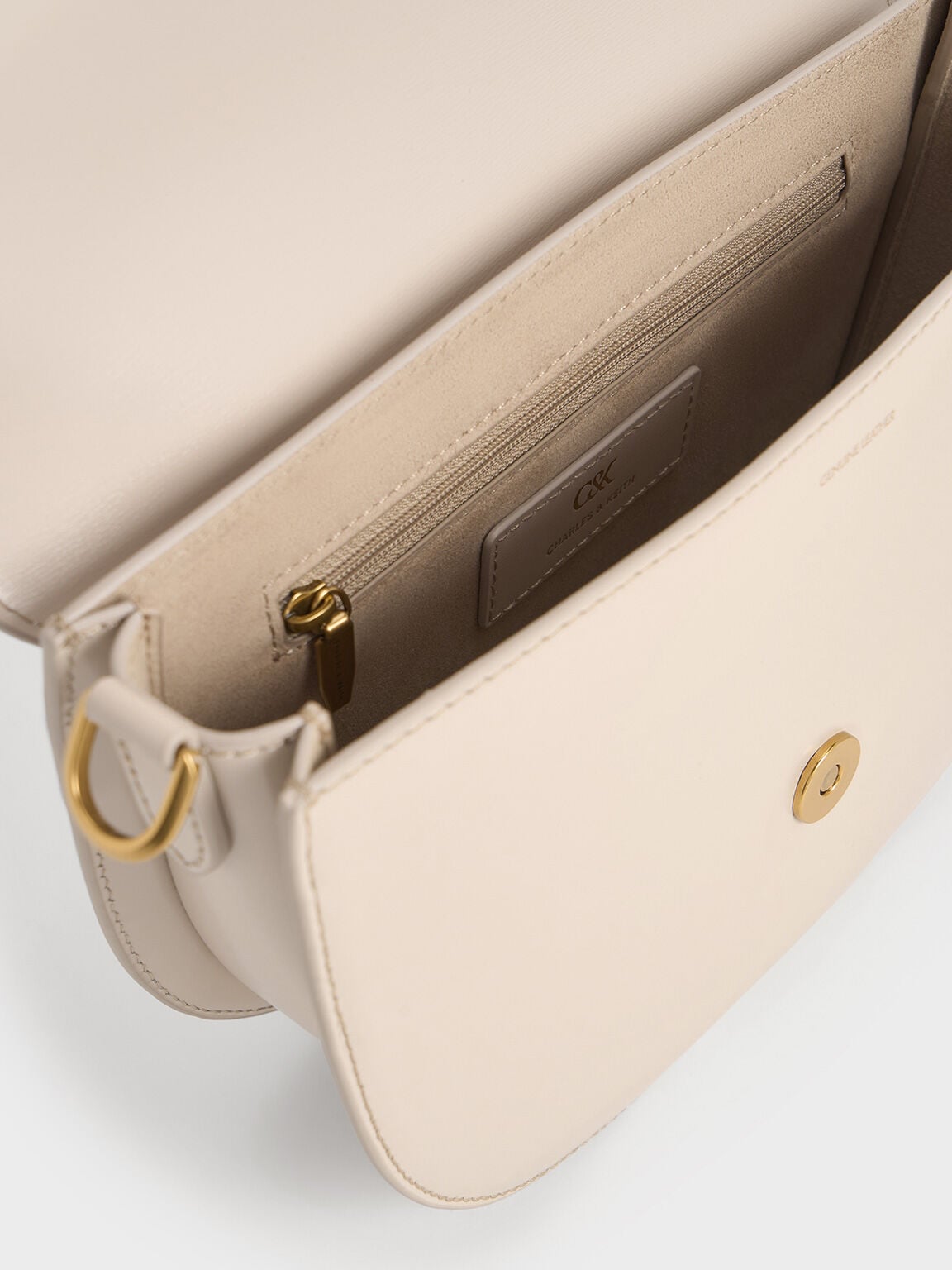 CHARLES & KEITH Deals / Gabine Leather Saddle Bag - Oat