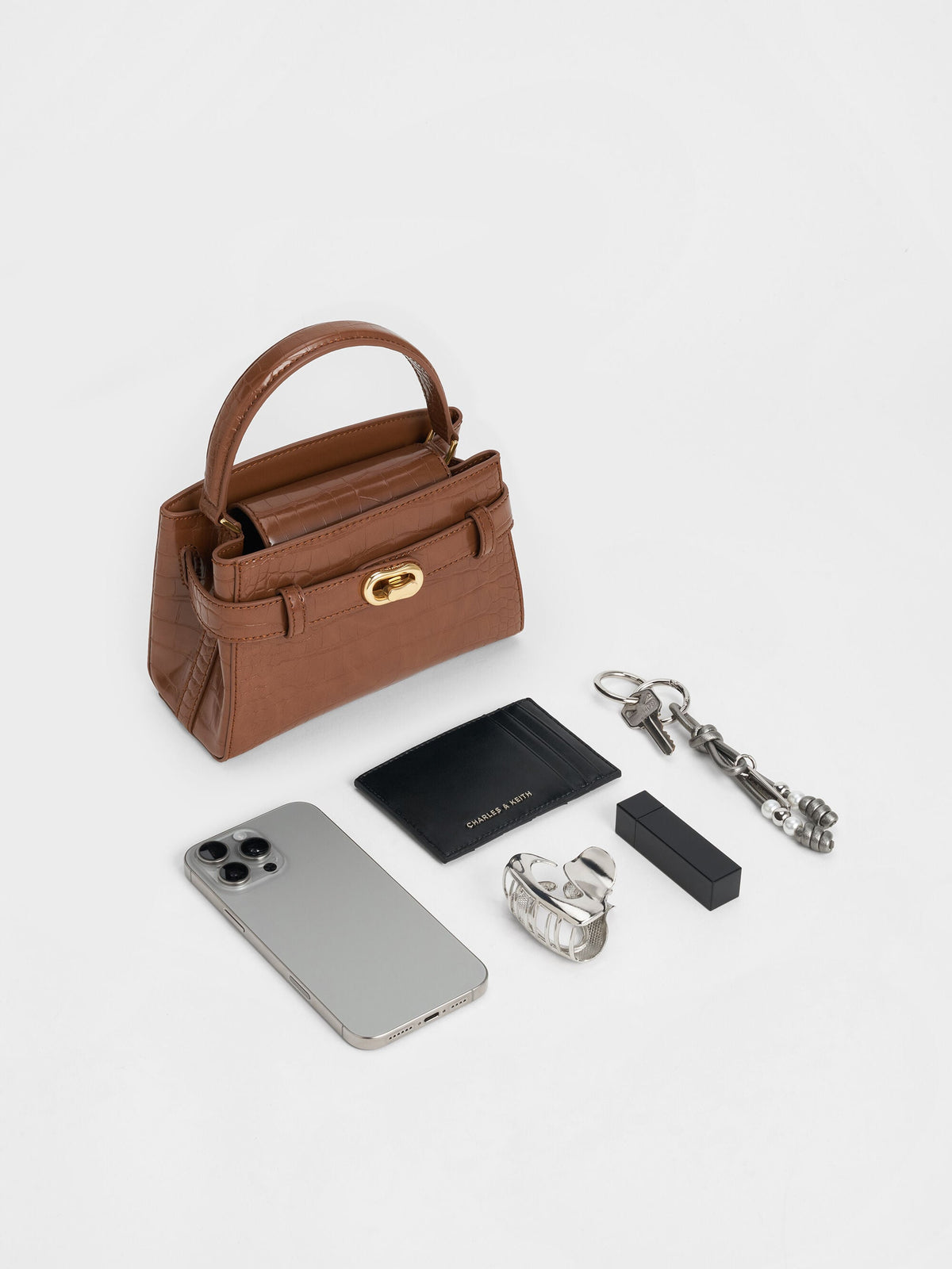 CHARLES & KEITH Trending / Aubrielle Croc-Effect Belted Top Handle Bag - Chocolate Croco