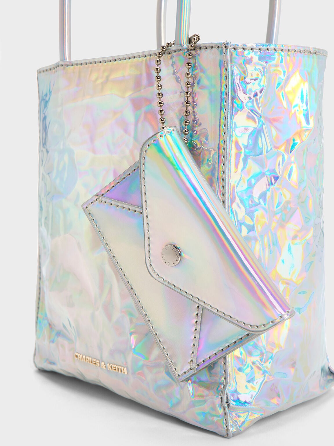 CHARLES & KEITH Latest / Matina Holographic Crinkle-Effect Tote Bag - Prism Silver