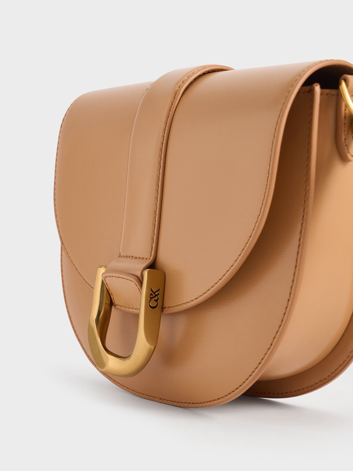 CHARLES & KEITH Latest / Gabine Leather Saddle Bag - Toffee