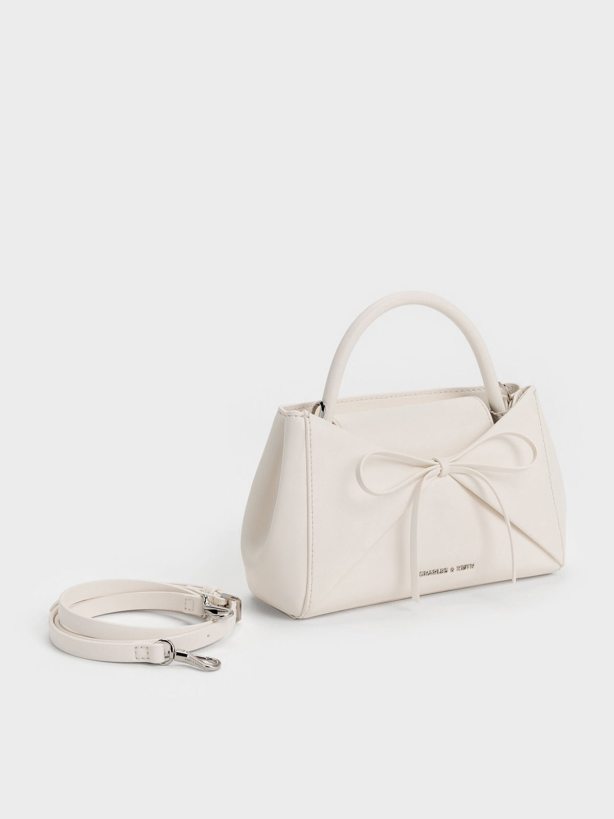 CHARLES & KEITH Top Pick / Hazel Bow Panelled Top Handle Bag - Cream