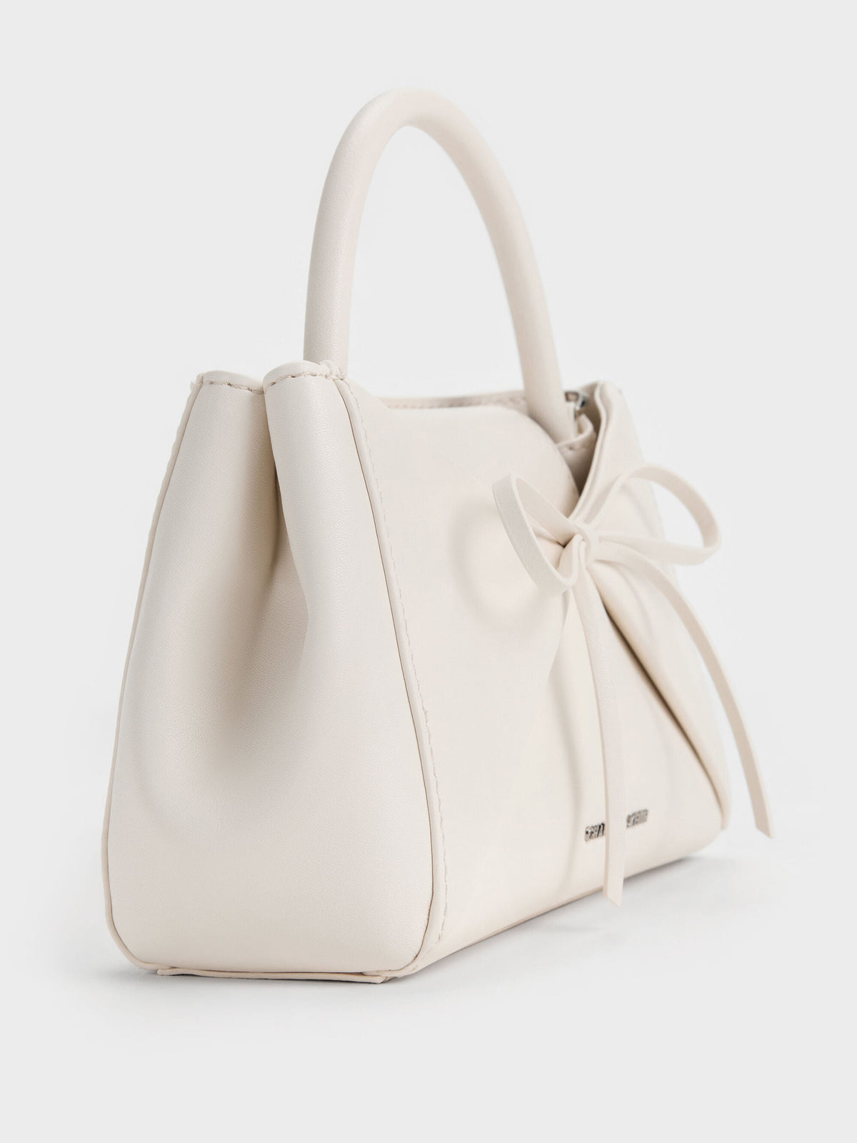 CHARLES & KEITH Top Pick / Hazel Bow Panelled Top Handle Bag - Cream