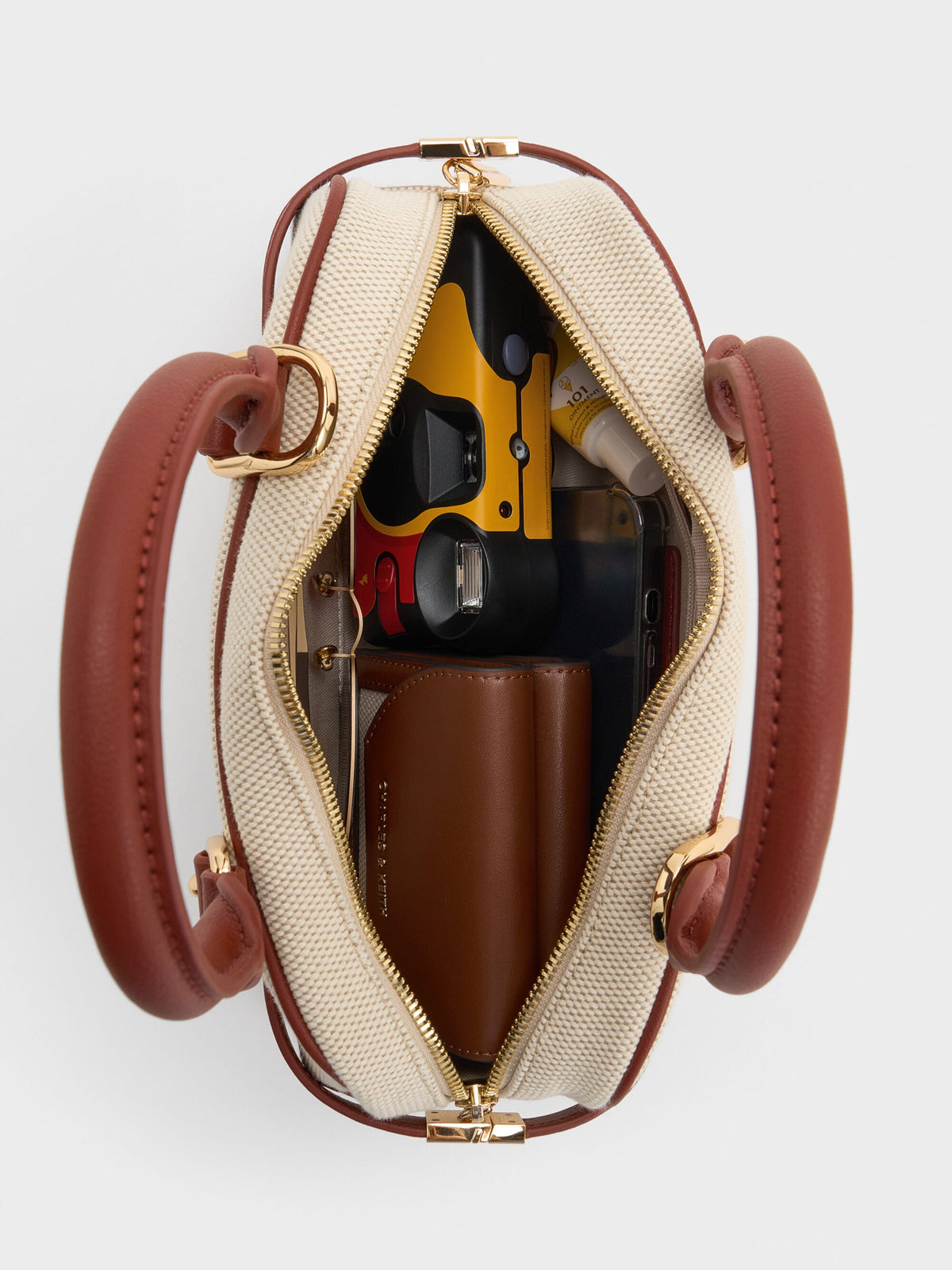 CHARLES & KEITH Customer Favorite / Scottie Canvas Bowling Bag - Brick