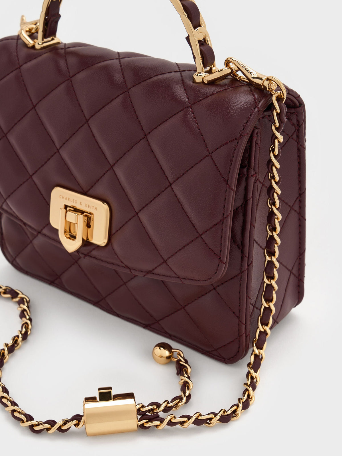 CHARLES & KEITH Deals / Cressida Quilted Top Handle Bag - Wineberry Red