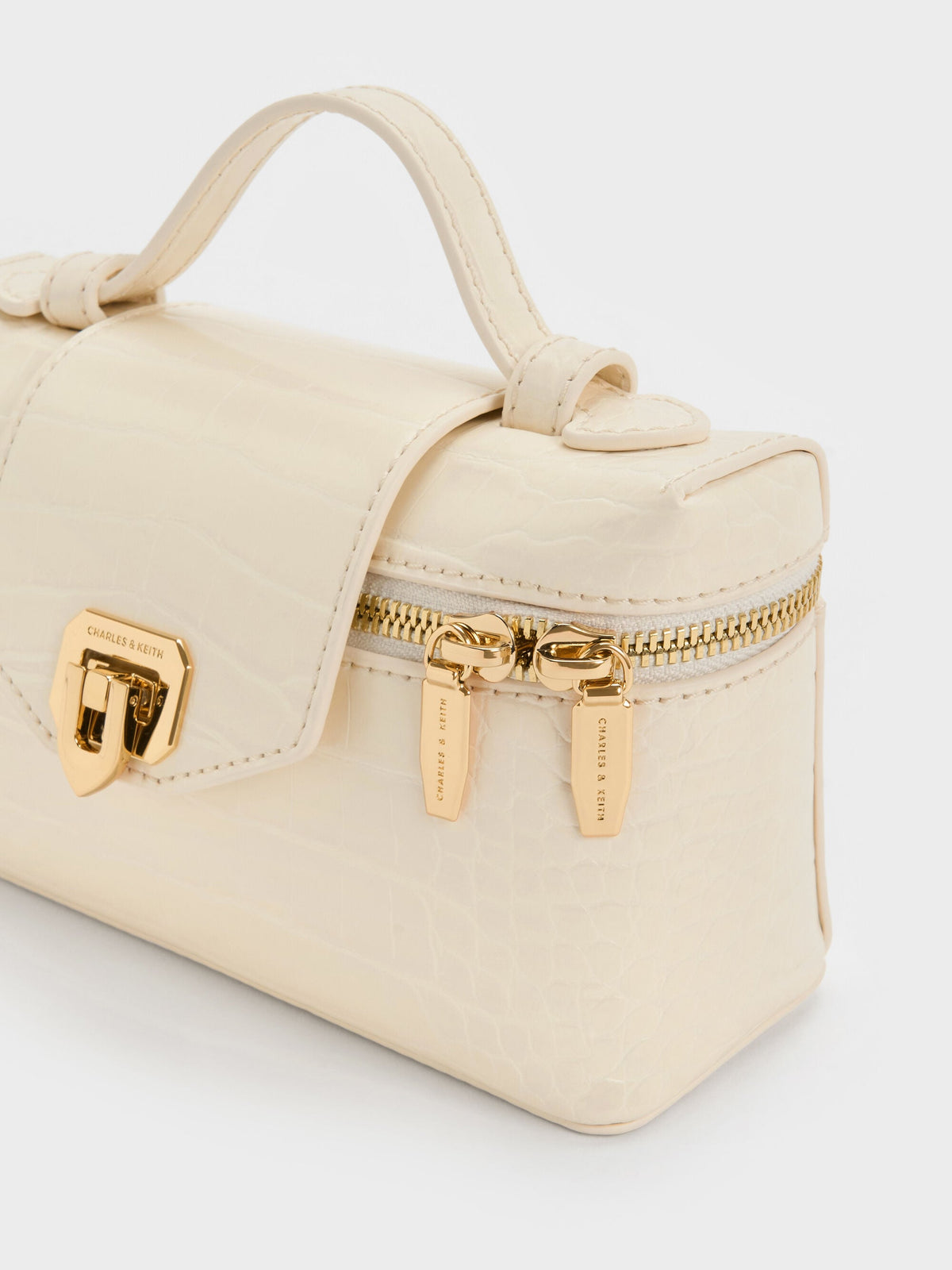 CHARLES & KEITH Hot Sale / Arwen Croc-Effect Top Handle Vanity Bag - Cream