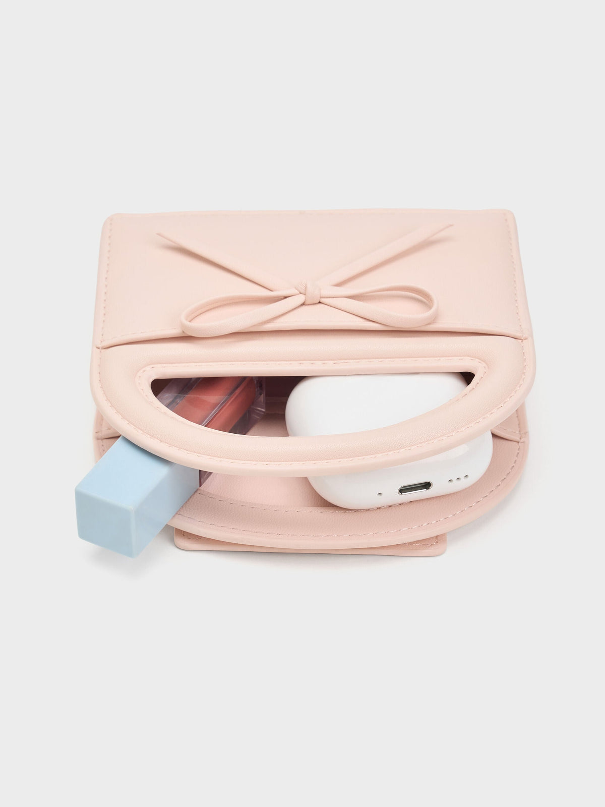 CHARLES & KEITH Signature / Reese Bow Top Handle Wristlet - Soft Pink