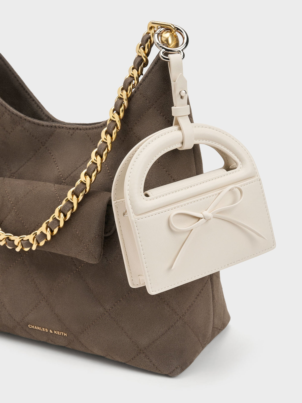CHARLES & KEITH Smart Buy / Reese Bow Top Handle Wristlet - Cream