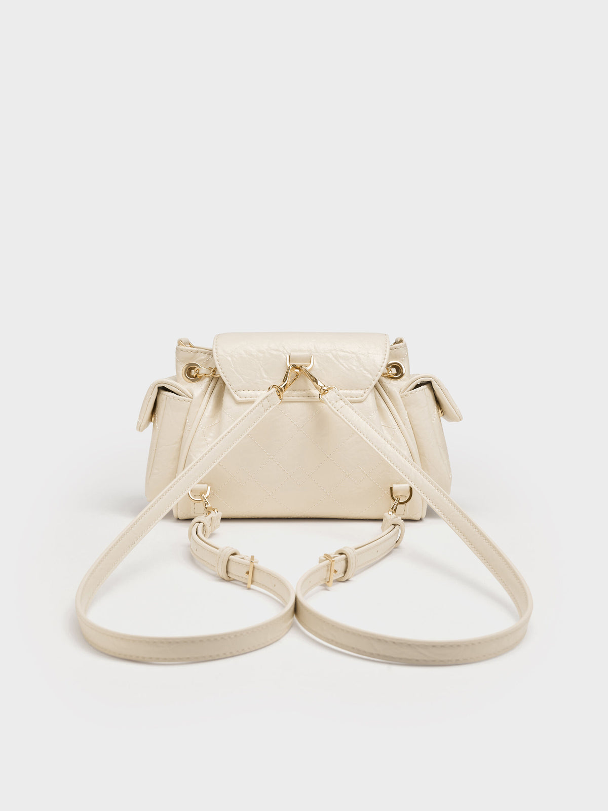 CHARLES & KEITH Best Seller / Duo Quilted Two-Way Front Flap Backpack - Cream