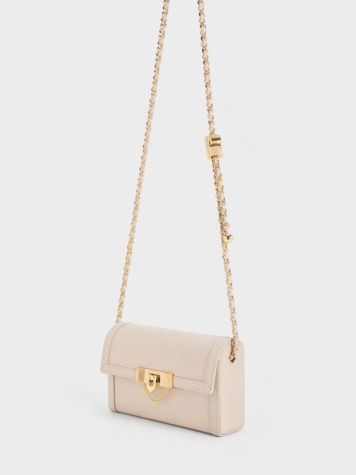 CHARLES & KEITH Premium / Tallulah Quilted Push-Lock Clutch - Oat
