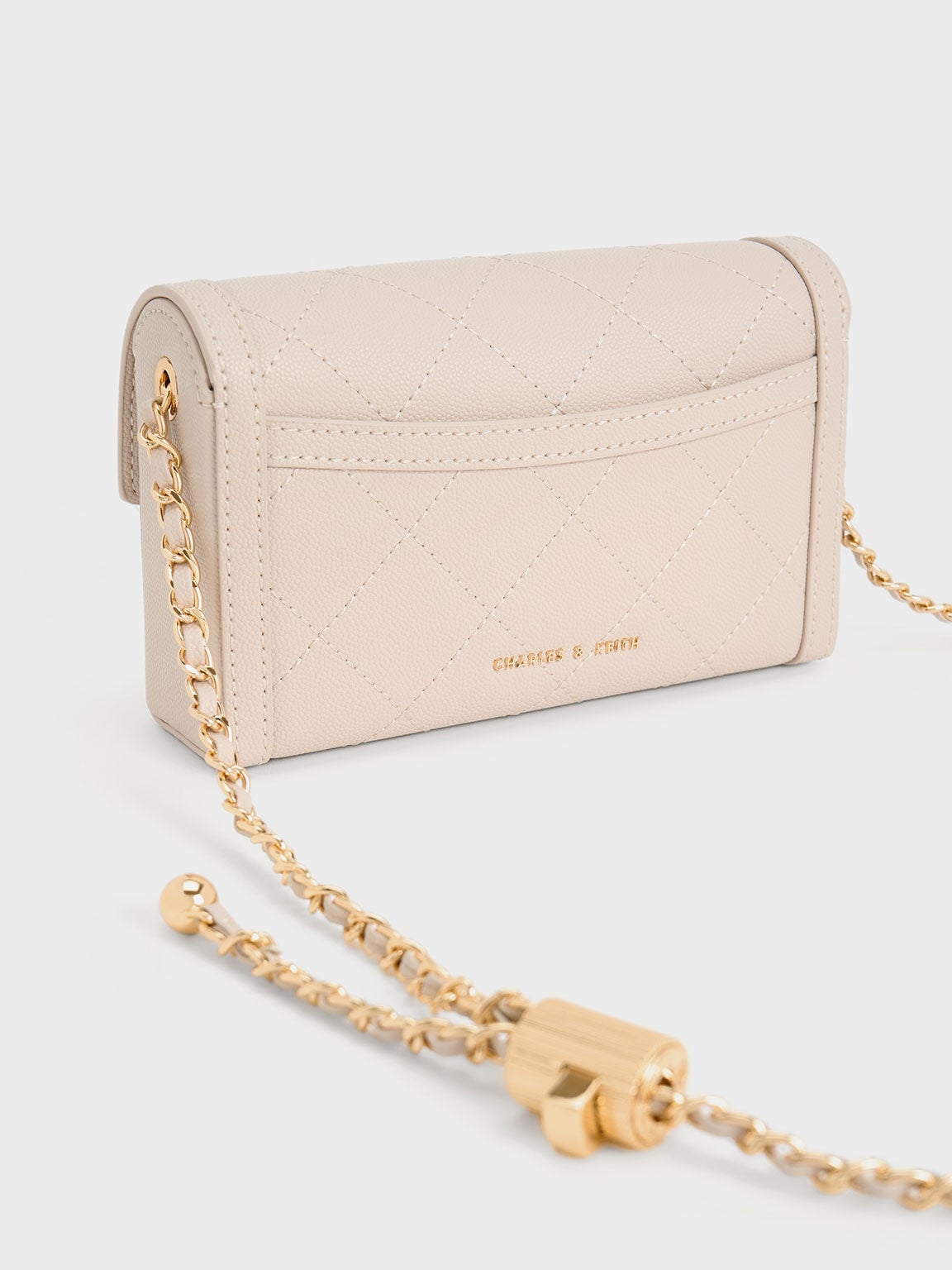 CHARLES & KEITH Premium / Tallulah Quilted Push-Lock Clutch - Oat