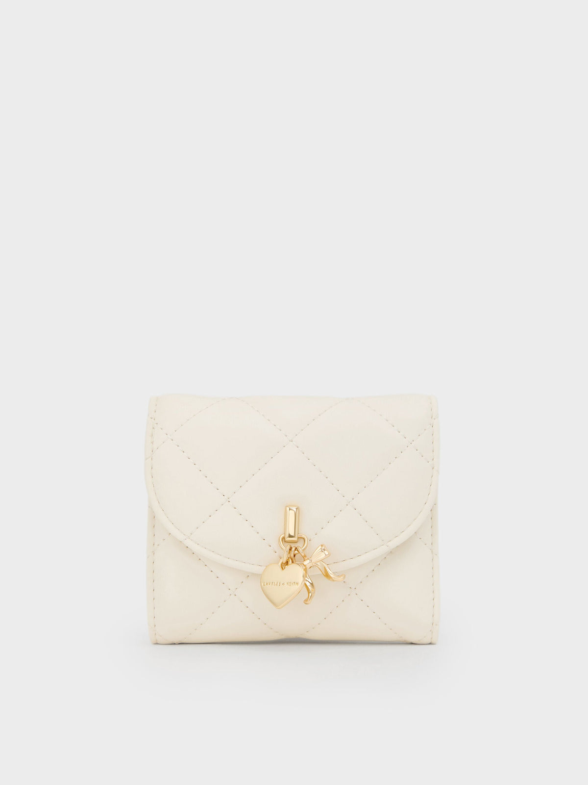 CHARLES & KEITH Essential / Arrietty Quilted Curved-Flap Wallet - Cream