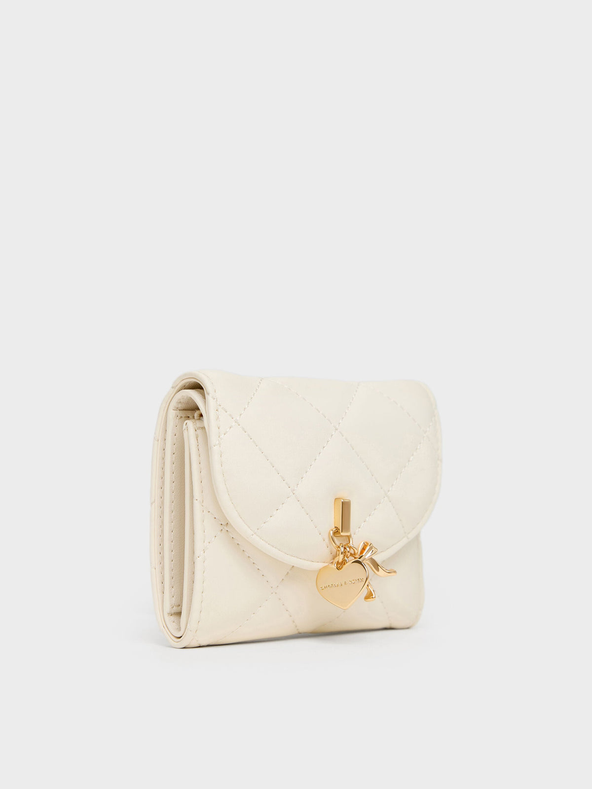 CHARLES & KEITH Essential / Arrietty Quilted Curved-Flap Wallet - Cream
