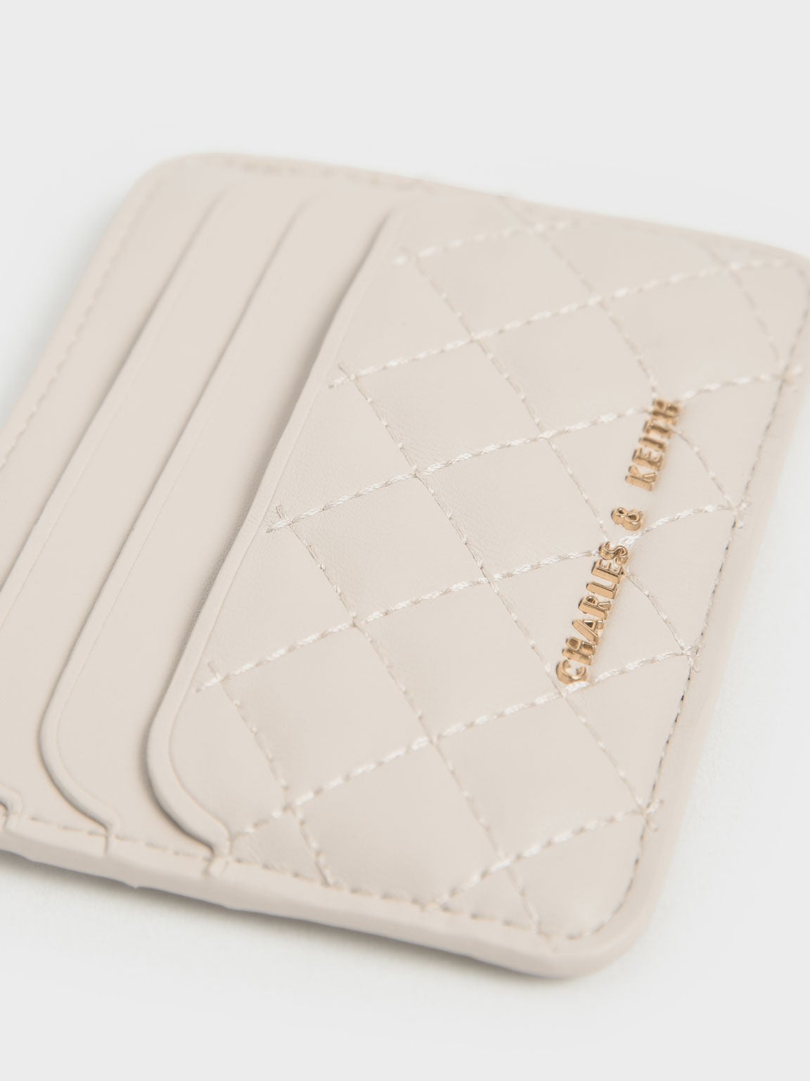CHARLES & KEITH Top Pick / Cleo Quilted Card Holder - Ivory