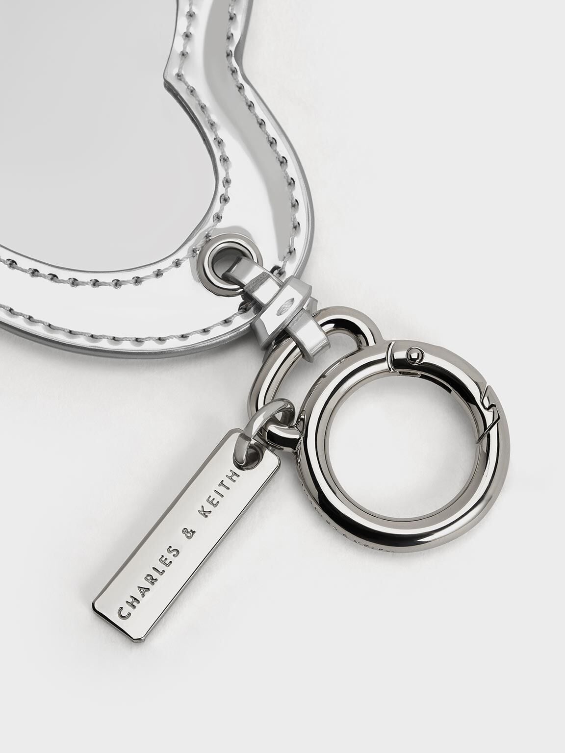 CHARLES & KEITH Trending / Metallic Heart Quilted Mirror Charm - Silver